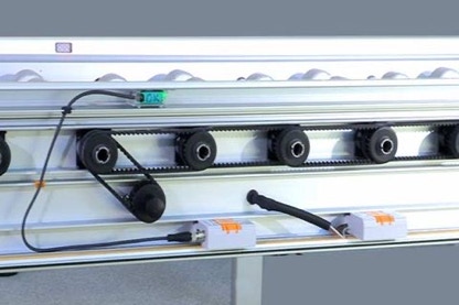drive system and controlled system inside the frame of roller conveyor